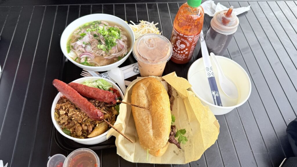 Bánh Mì Factory Zillmere menu board showing banh mi, noodle salad, rice paper rolls and pho prices