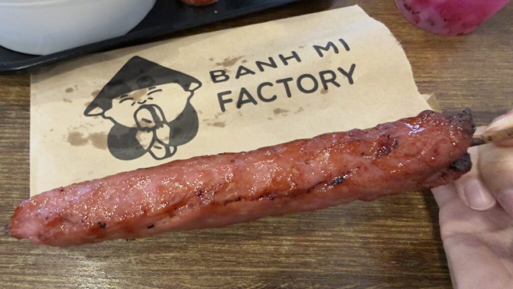 Bánh Mì Factory Zillmere menu board showing banh mi, noodle salad, rice paper rolls and pho prices